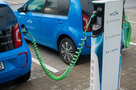 Vilnius, Lithuania - September 22, 2016: Volkswagen Spark electric car connected to charge station at day timeのeditorial素材