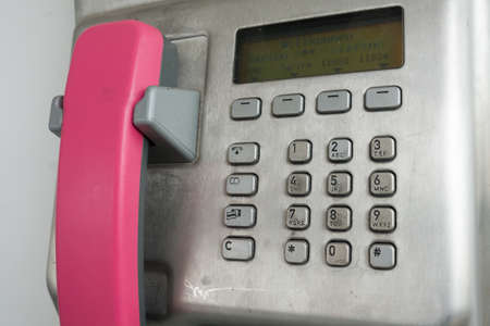 Modern payphone on a city street