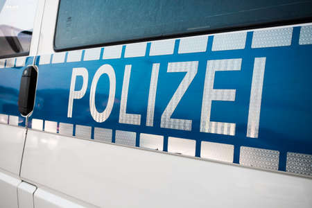German police sign on the patrol carの写真素材