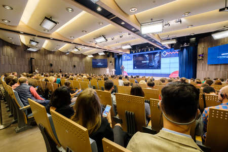 Moscow, Russia - September 2, 2016: People attend Digital Marketing Conference in Russia Today information agency big hall at day time.のeditorial素材