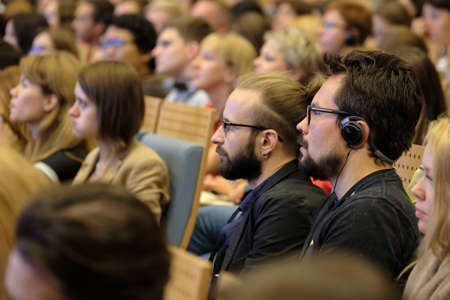 Moscow, Russia - September 2, 2016: People attend Digital Marketing Conference in Russia Today information agency big hall at day time.のeditorial素材