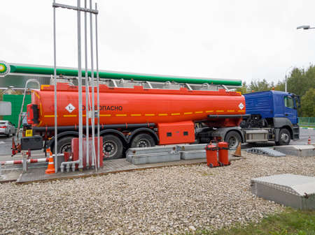 Chekhov, Russia - September 30, 2016: Truck unload petrol on filling station BP at day timeのeditorial素材