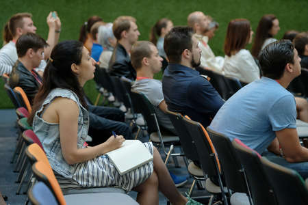 Moscow, Russia - September 3, 2016: People attend Digital Marketing Conference in big hall of Mail.ru internet companyのeditorial素材