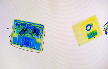 Scanned baggage on the x-ray scanner screen in the airport