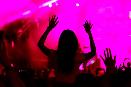 Fans cheering at open-air live concert. Image not in focusの写真素材