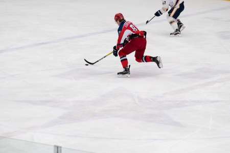 Chekhov, Russia - January 7, 2016: Hockey match between the teams Zvezda (Chekhov) and Orsk (Southern Urals) in Vityaz Ice Palace. Zvezda wins 4:2のeditorial素材