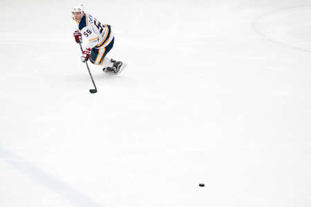 Chekhov, Russia - January 7, 2016: Hockey match between the teams Zvezda (Chekhov) and Orsk (Southern Urals) in Vityaz Ice Palace. Zvezda wins 4:2のeditorial素材