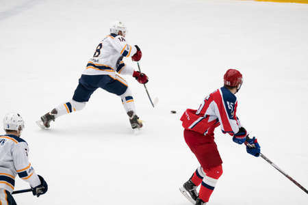 Chekhov, Russia - January 7, 2016: Hockey match between the teams Zvezda (Chekhov) and Orsk (Southern Urals) in Vityaz Ice Palace. Zvezda wins 4:2のeditorial素材