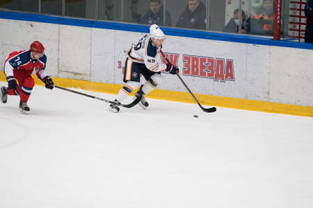 Chekhov, Russia - January 7, 2016: Hockey match between the teams Zvezda (Chekhov) and Orsk (Southern Urals) in Vityaz Ice Palace. Zvezda wins 4:2のeditorial素材