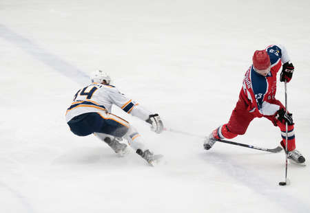 Chekhov, Russia - January 7, 2016: Hockey match between the teams Zvezda (Chekhov) and Orsk (Southern Urals) in Vityaz Ice Palace. Zvezda wins 4:2のeditorial素材