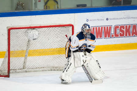Chekhov, Russia - January 7, 2016: Goalkeeper at hockey match between the teams Zvezda (Chekhov) and Orsk (Southern Urals) in Vityaz Ice Palace. Zvezda wins 4:2のeditorial素材