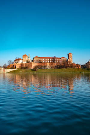 Famous landmark Wawel castle seen from Vistula, Krakow, Poland.の写真素材