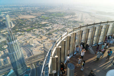 Dubai, UAE - January 06, 2017: Tourists meet sunrise at the observation deck on the 125 floor of Khalifa towerのeditorial素材