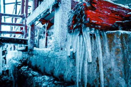 Abstract winter landscape with red and iciclesの写真素材