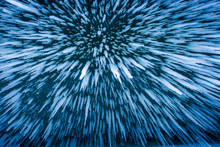 Lot of sharp and long icicles bottom viewの写真素材