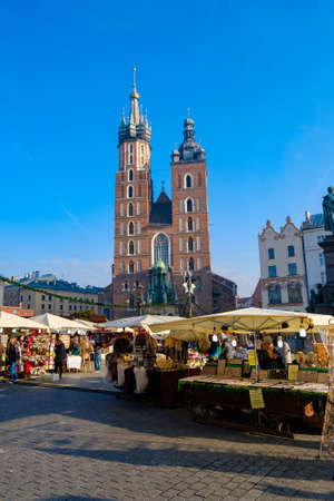 Krakow, Poland - December 20, 2016: People visit Christmas market at main square in old cityのeditorial素材