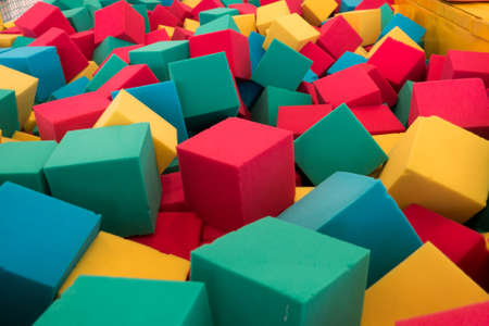 Multicolored foam cubes on the playgroundの写真素材