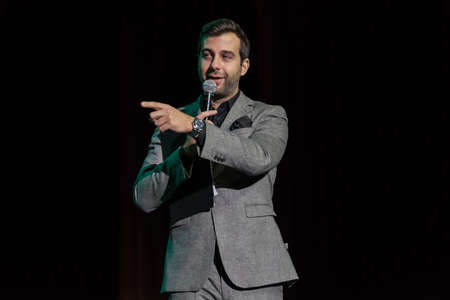 Moscow, Russia - April 24, 2017: Famous Russian showman Ivan Urgant performs at Synergy Global Forum at Crocus Expo Hall. This is one of the largest business forums with more than 5000 participantsのeditorial素材