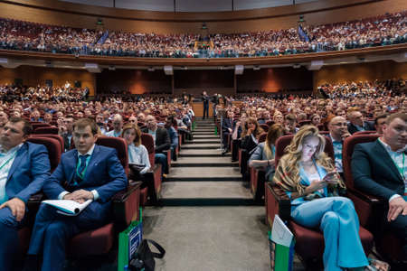Moscow, Russia - April 24, 2017: People attend Synergy Global Forum at Crocus Expo Hall. This is one of the largest business forums with more than 5000 participantsのeditorial素材