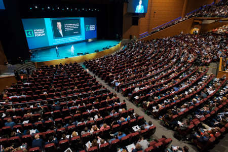 Moscow, Russia - April 24, 2017: People attend Synergy Global Forum at Crocus Expo Hall. This is one of the largest business forums with more than 5000 participantsのeditorial素材