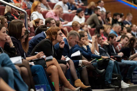 Moscow, Russia - April 24, 2017: People attend Synergy Global Forum at Crocus Expo Hall. This is one of the largest business forums with more than 5000 participantsのeditorial素材