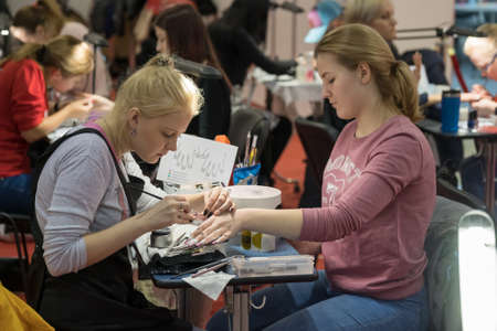 Moscow, Russia - March 3, 2017: Competition of manicure at the Esthetic Life Exhibitionのeditorial素材