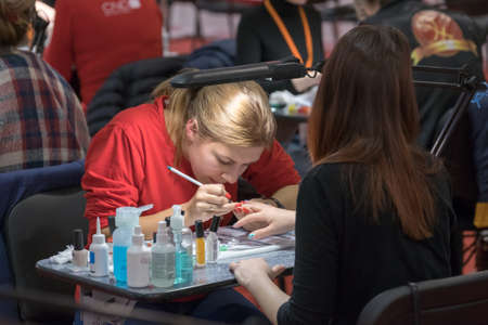 Moscow, Russia - March 3, 2017: Competition of manicure at the Esthetic Life Exhibitionのeditorial素材