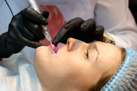 Moscow, Russia - March 3, 2017: Cosmetology procedure demonstration at the Esthetic Life Exhibitionのeditorial素材