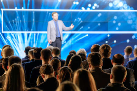 Audience listens to the lecturer at the conference hallの写真素材