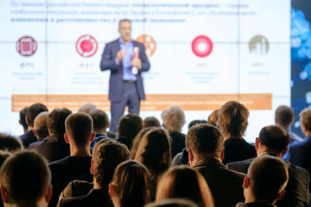 Audience listens to the lecturer at the conference hallの写真素材