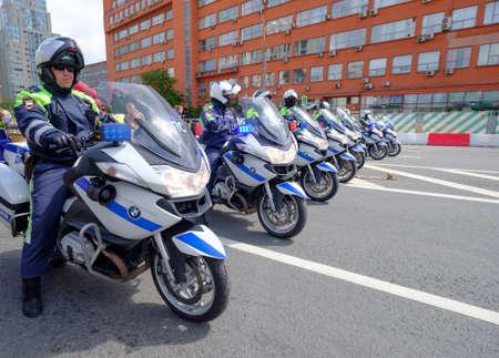 Moscow, Russia - May 28, 2017: Motorcade of police motorcyclists is accompanied by a bicycle paradeのeditorial素材