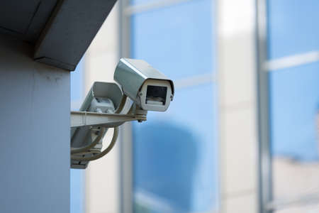 CCTV outdoor camera on the wallの写真素材