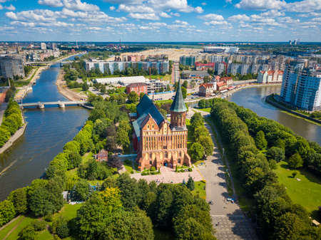 Aerial cityscape of Kant Island in Kaliningrad, Russia at sunny summer day with white clouds in the blue skyの写真素材