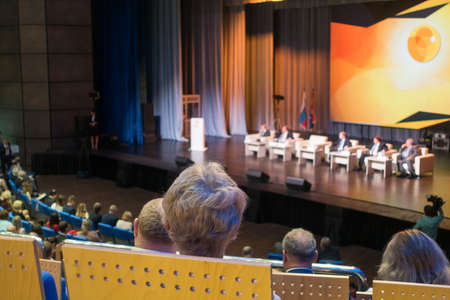 Audience listens to the lecturer at the conference hallの写真素材