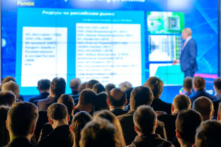 Audience listens to the lecturer at the conference hallの写真素材