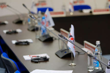 Table microphones at conference hallの写真素材