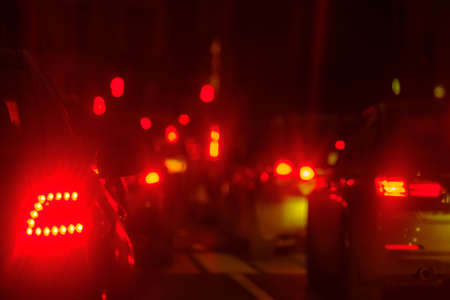 Traffic jam at the city centre back view at the nightの写真素材