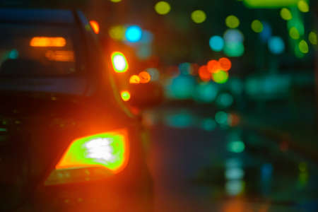 Traffic jam at the city centre back view at the nightの写真素材