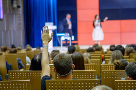 Audience listens to the lecturer at the conference hallの写真素材
