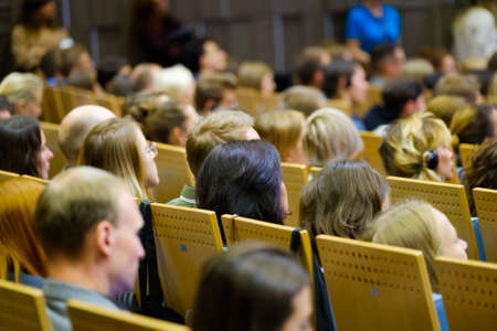 Audience listens to the lecturer at the conference hallの写真素材