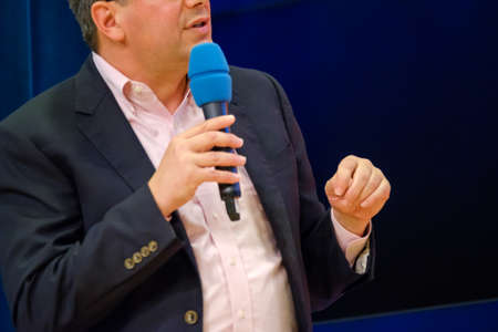 Man speaking at the conference