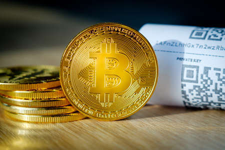 Bitcoin golden coins and paper receipt macroの写真素材