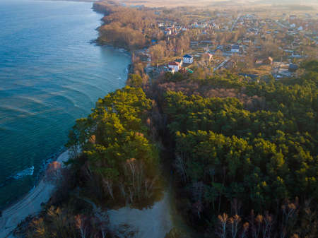 Aerial view of Baltic sea coast with small settlementの写真素材