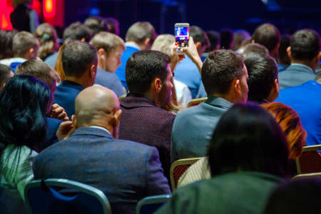 People attend business conference in the congress hallの写真素材
