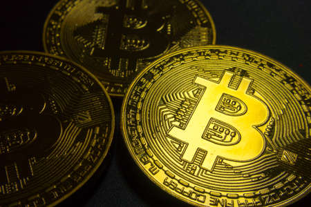 Bitcoin macro symbol sign close-up golden coins