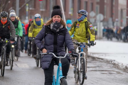 Moscow - February 11, 2017: Many cyclists participate in winter bicycle parade around the city centreのeditorial素材