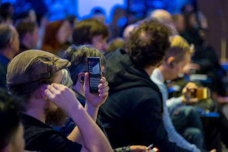 Audience listens to the lecturer at the conference hallの写真素材
