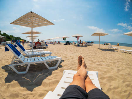 Yantarnyi - Russia, June 2, 2018: People are sunbathing at renovated beach at sunny day timeのeditorial素材
