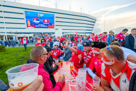 Kaliningrad - Russia, June 22, 2018: Football fans support teams on the street of the city on the day of the match between Serbia and Switzerlandのeditorial素材