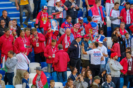 Kaliningrad - Russia, June 22, 2018: Football fans support teams on the match between Serbia and Switzerlandのeditorial素材